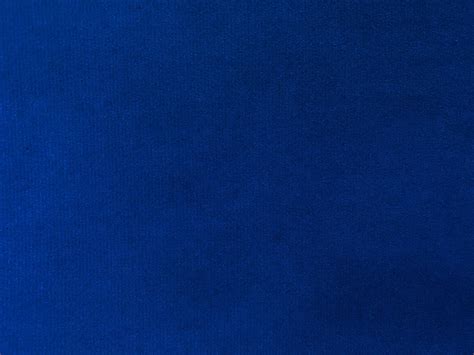 Blue velvet fabric texture used as background. Empty blue fabric ...