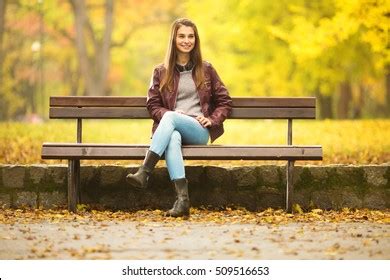 168,948 Woman Sitting On Bench Stock Photos, Images & Photography | Shutterstock