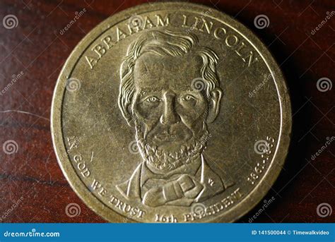 Abraham Lincoln Portrait on Gold Dollar Coin Stock Photo - Image of dollar, coin: 141500044