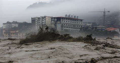 China floods sweep away bridges, houses and hillsides, killing at least 19 in Sichuan province ...