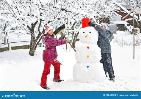 Snowman And Kids Stock Photo - Image: 22049500