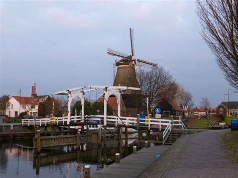 Harderwijk Netherlands Windmill Bridge Harbor | Netherlands windmills, Netherlands, Canals