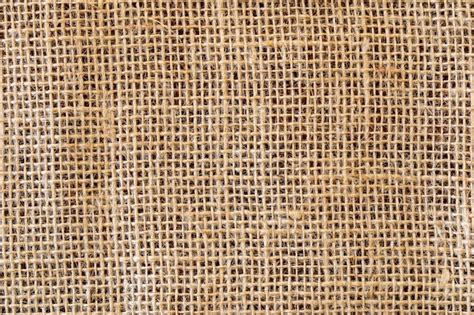 Premium Photo | Texture of rustic jute fabric. top view