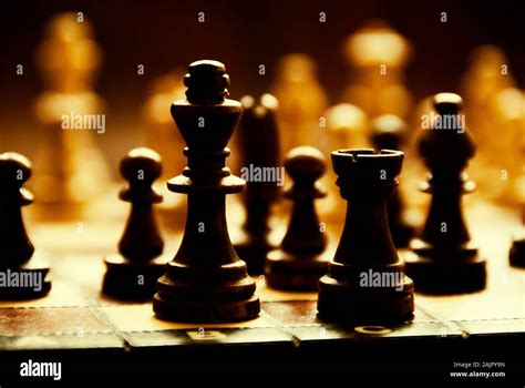 black pieces of chess on the chessboard Stock Photo - Alamy