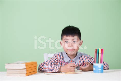 Boy Homework At Home Stock Photo | Royalty-Free | FreeImages