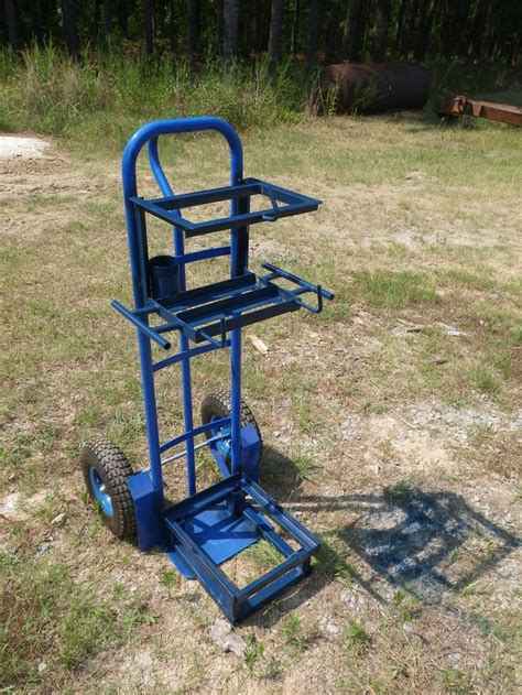 Stick welder cart made from a heavy duty harbor freight hand truck . Made the base for stick ...