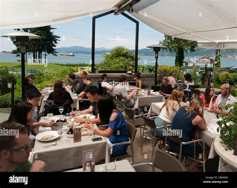 People dining at The Teahouse restaurant in Stanley Park in Vancouver Canada Stock Photo - Alamy