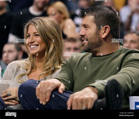 Boston Red Sox catcher Jason Varitek and his wife, Catherine, watch the ...