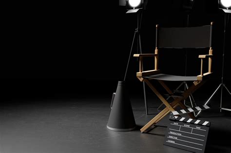 Director Chair,Megaphone,Movie Clapper and lighting equipment on dark ...