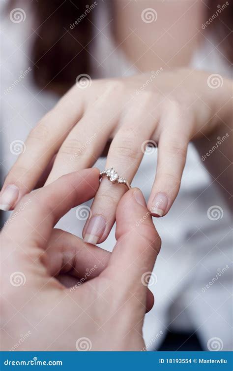 Engagement Ring Into A Finger Stock Images - Image: 18193554