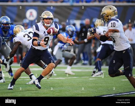 Liberty Bowl Memorial Stadium. 14th Oct, 2017. TN, USA; NAVY quarterback, ZACH ABEY (9) pitches ...