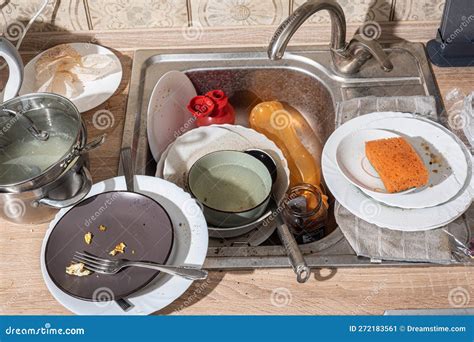 Messy Kitchen with Dirty Dishes Piled Up in the Sink and on the Counter Stock Image - Image of ...