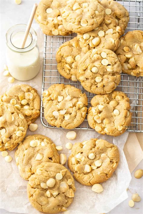 Top down view of a batch of cookies on a wire cooling rack.