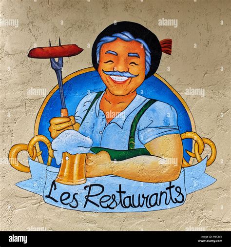 Restaurant wall art advertising with beaming and happy French host ...