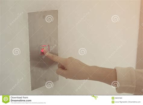 Pushing Button. Close-up of Female Hand Pushing Button of Elevator ...