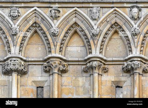 Decorated gothic stone arches on the west wall at the medieval ...