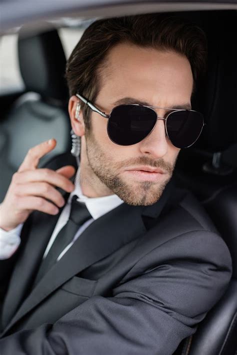 Bearded Bodyguard in Sunglasses and Suit Stock Photo - Image of parking ...