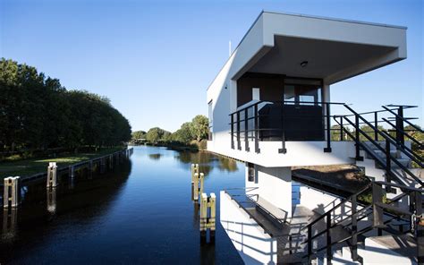 Amsterdam’s historic bridge houses transformed into micro hotel suites | Archello