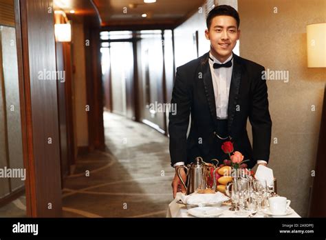 The hotel waiter Stock Photo - Alamy