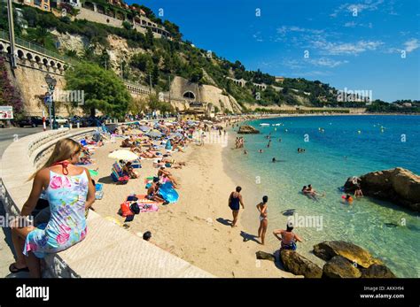 The beach at the lovely town of Villefranche sur Mer near Nice on the French Riviera Stock Photo ...