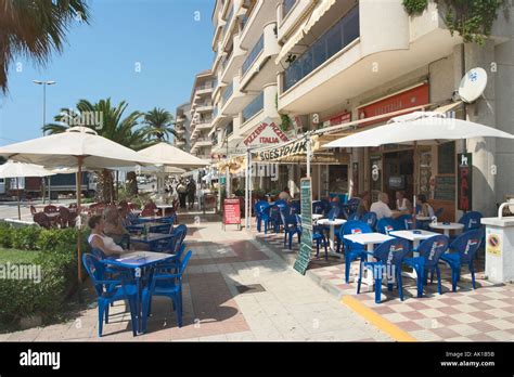 Sidewalk cafe in Pineda de Mar, Costa Brava, Catalunya, Spain Stock Photo - Alamy