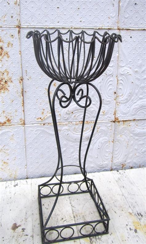 tall wrought iron plant classical stand gate photo | Wrought iron plant stands, Iron plant stand ...