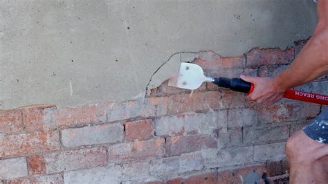 How to Remove Plaster from Brick Walls with a Long Reach Scraper - YouTube