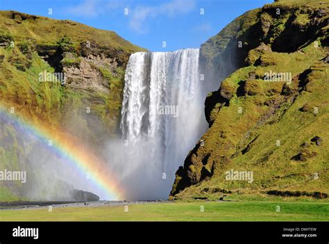 Waterfall and rainbow at skogafoss Iceland Stock Photo - Alamy