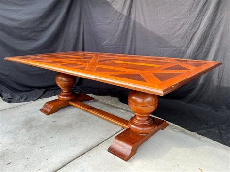 Large wood dining table | EstateSales.org