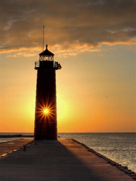 Kenosha Lighthouse Sunburst Photograph by Dale Kauzlaric - Fine Art America