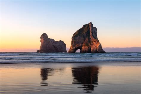 Archway Islands of Wharariki Beach | Sunset Obsession