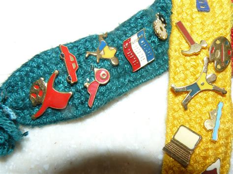 Webelos Ribbons and Badge pins from the 1980's. 21 brass