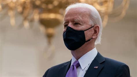 Biden says vaccine rollout has been a 'dismal failure' and urges Americans to wear a mask for 99 ...