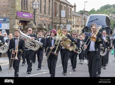 Brass bands marching on the street at the Uppermill Whit Friday Contest ...