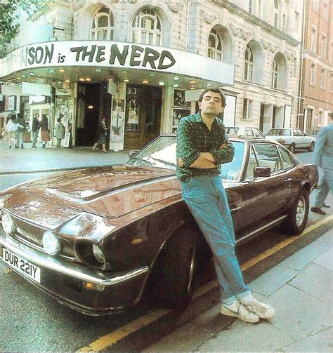 Rowan Atkinson with his 81' Aston Martin Vantage V8 in London 1984 | Aston martin, Street wear ...