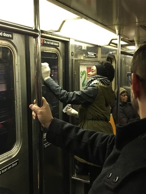 New York Commuters Unite To Remove Anti-Semitic Graffiti On Subway