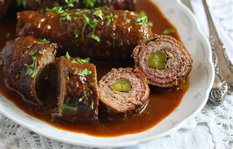 plate of sliced meat roulades with lots of sauce and parsley | Rouladen recipe, Beef, Recipes