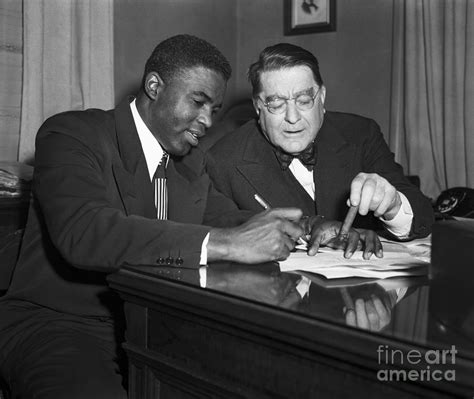 Jackie Robinson Signing Contract by Bettmann