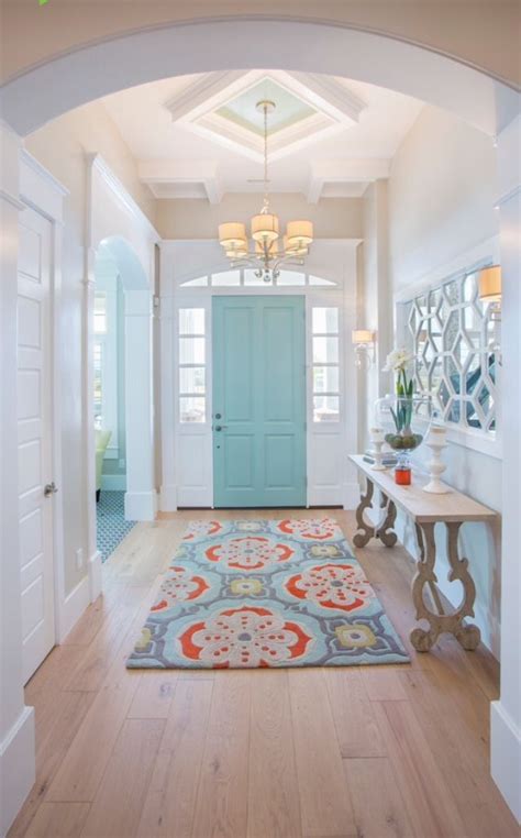 colorful doors: Love these inspiring entryways. The colorful rug brings this one all together