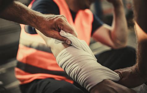 Taking Care Of Physical Injury At Work Stock Photo - Download Image Now - iStock