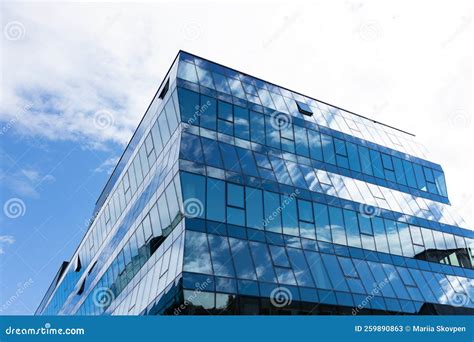 Modern Office Building with Glass Facade on a Sky Background ...