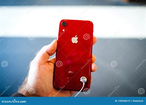 New Iphone Xr Red Color in Man Hand Editorial Stock Image - Image of iphone, business: 130058619