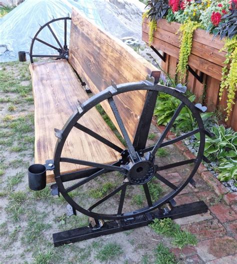 Pin on Tractor wheel ideas | Wagon wheel decor, Iron art, Woodworking ...