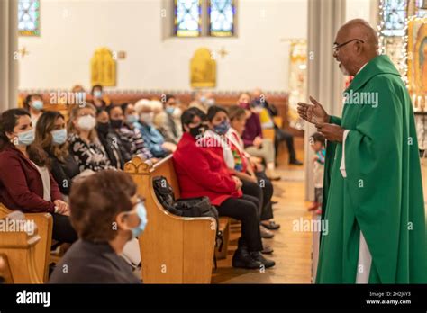 Detroit, Michigan - Fr. Adalberto Espinoza ("Padre Beto") delivers his homily at a mass at Holy ...