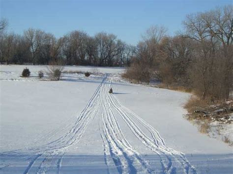 ArcticInsider - Where Do They Go?: Snowmobile Tracks in the Snow