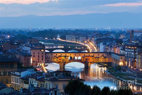 Florence, Italy night skyline. Ponte Vecchio bridge over Arno River ...