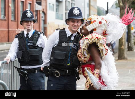 Notting hill carnival police dancing hi-res stock photography and ...