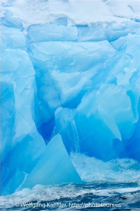 blue iceberg floating in Antarctica — Photo Tours