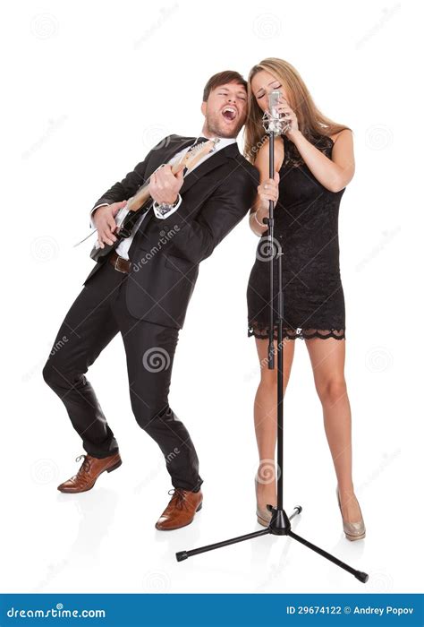 Couple Performs Duet To Everybody Stock Photography - Image: 29674122