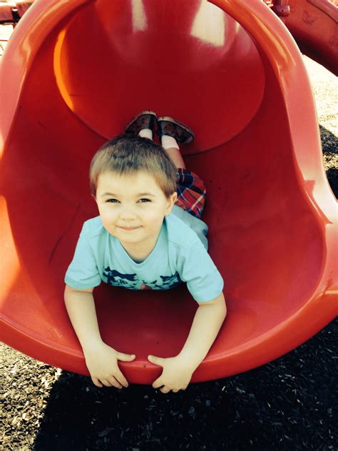 Boy On Slide Free Stock Photo - Public Domain Pictures